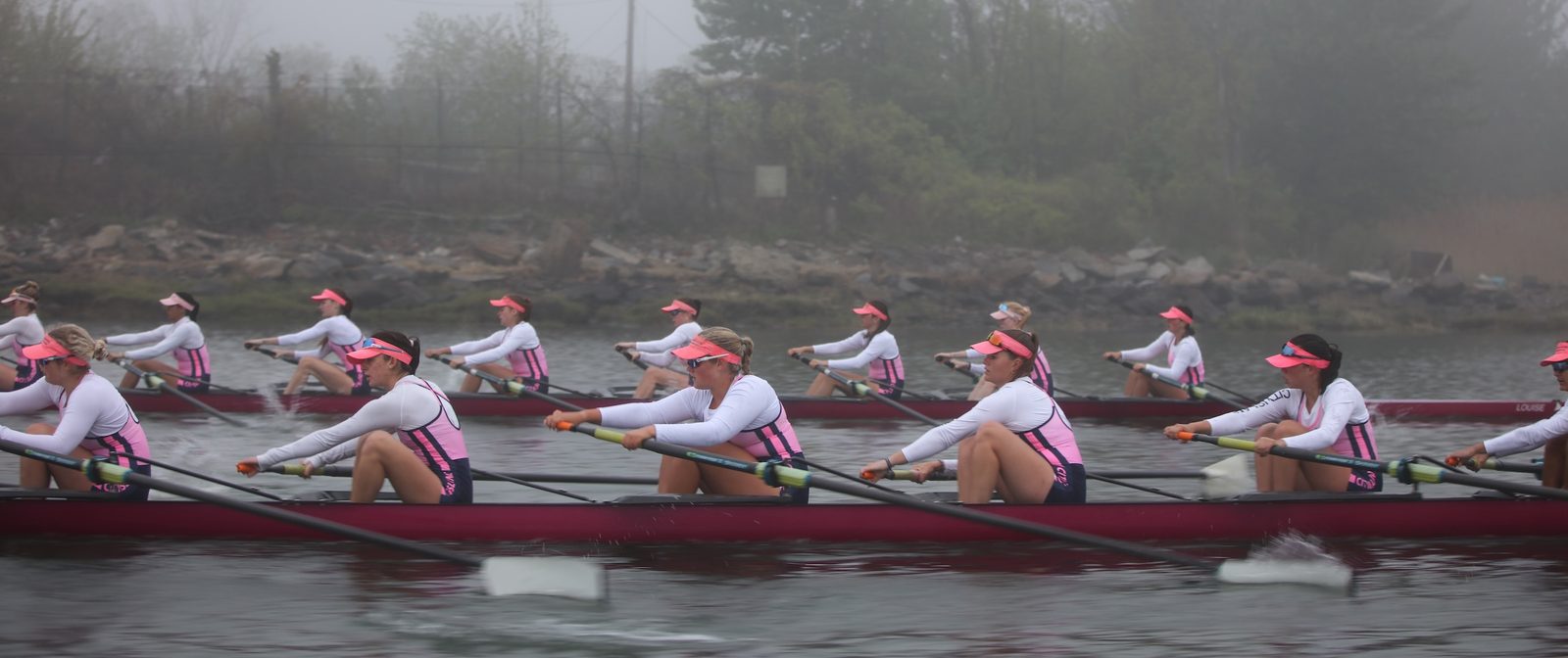Eights emerging in a line through the fog