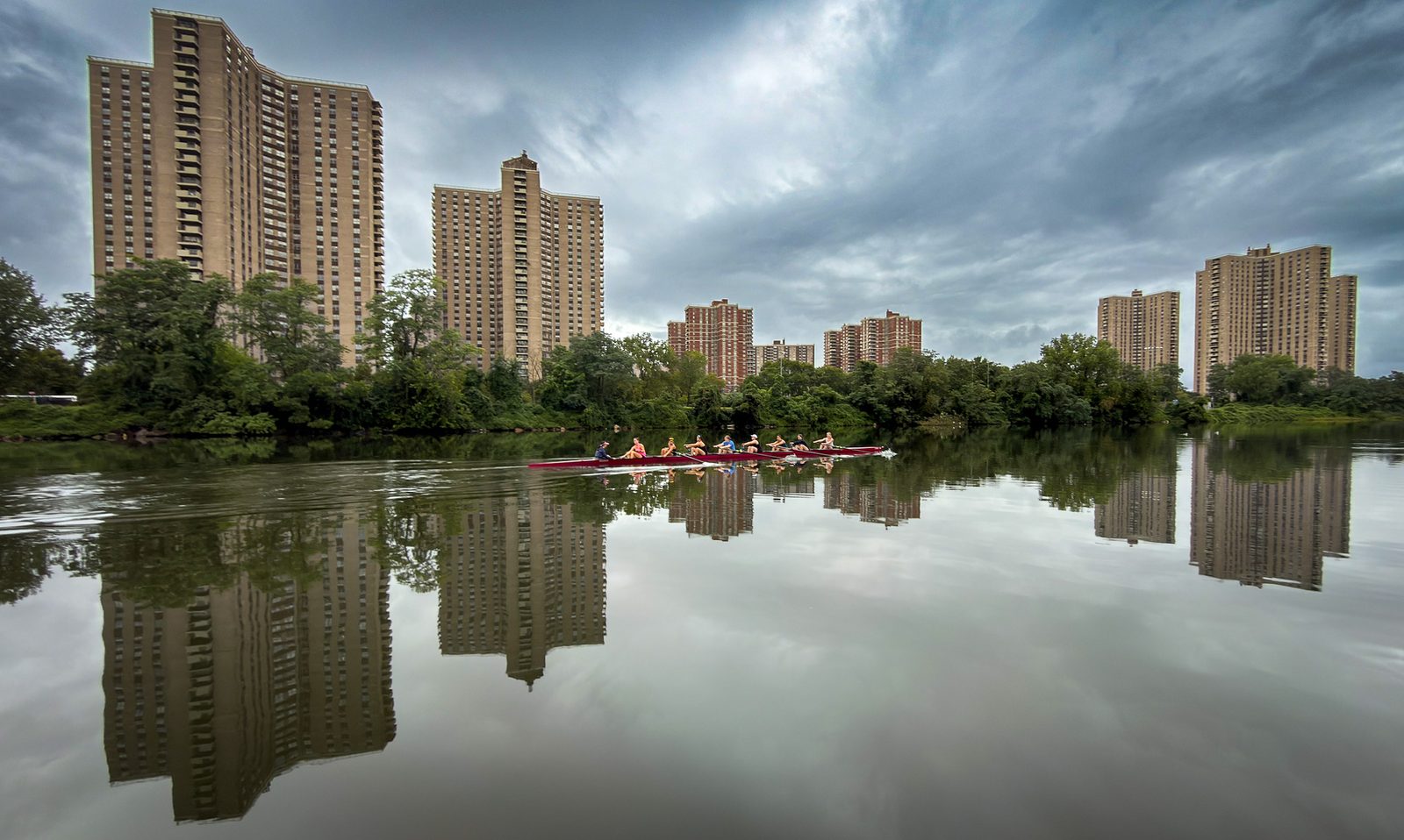An eight dwarfed by the towers along the river